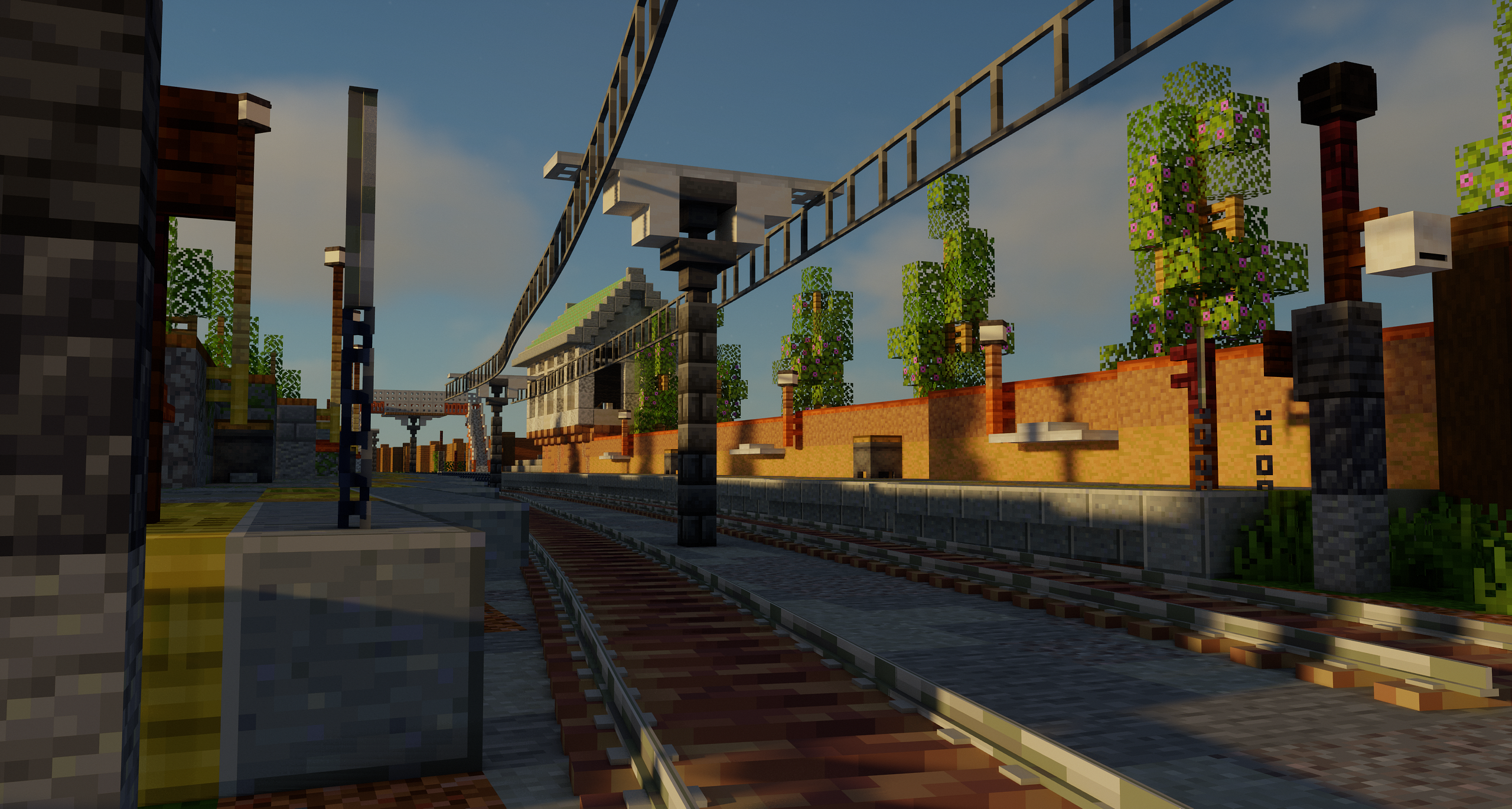 An image taken from the ECML tracks looking at Hennebont Marsh's platforms. The historic signalling box can be seen in the background.