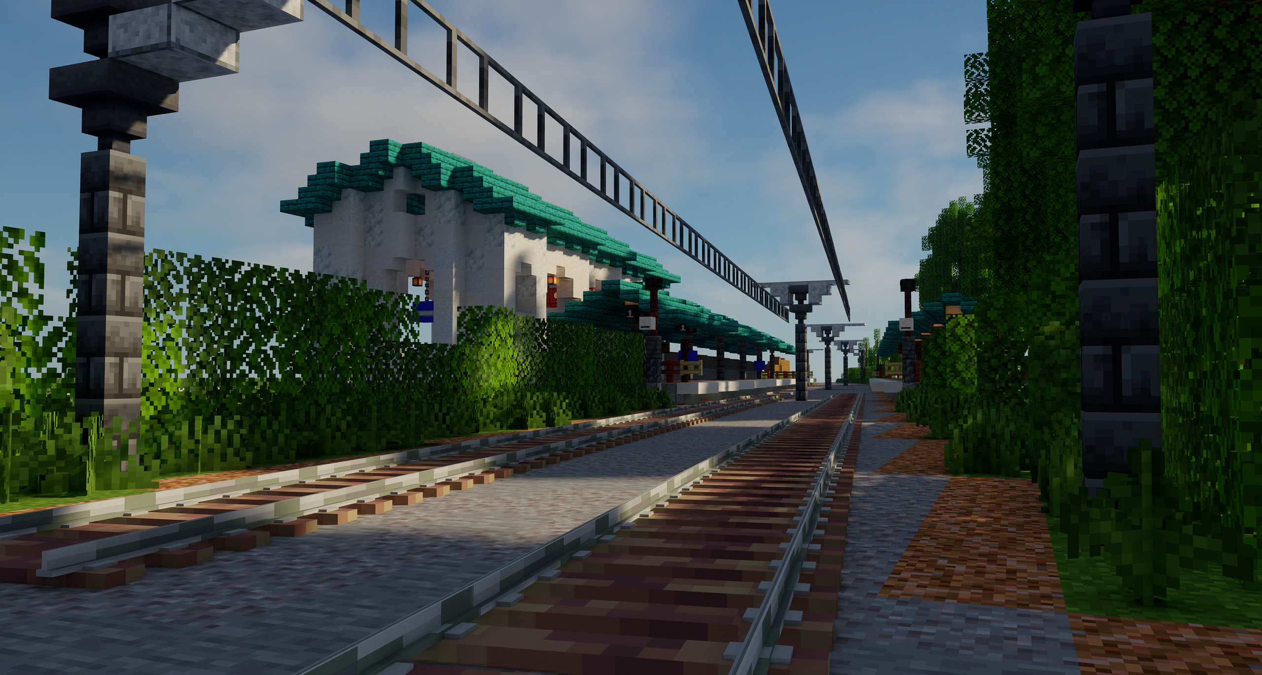 An image taken from the ECML tracks looking towards Point Blanc Station's buildings and platforms.